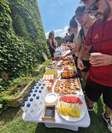 A long table of food shared by the team during an offsite